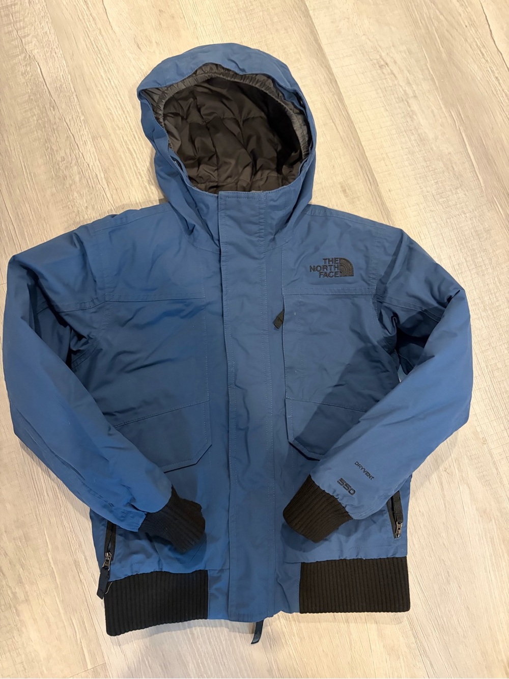 The North Face boys Blue Hooded Ski Jacket with Black Accents